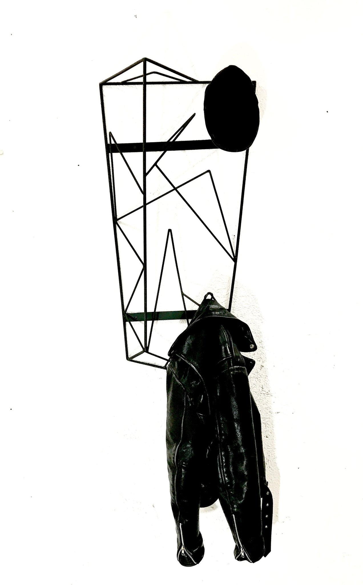 Sculptural hanger with top platform